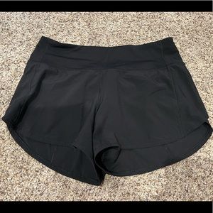 Black Lululemon 4” speed up shorts Size 6 tall Worn hand full of times no flaws